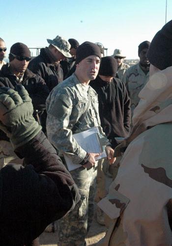 Lt. Joe Kilner, 23, the tactical movement team’s officer in charge, briefs soldiers before a morning run.