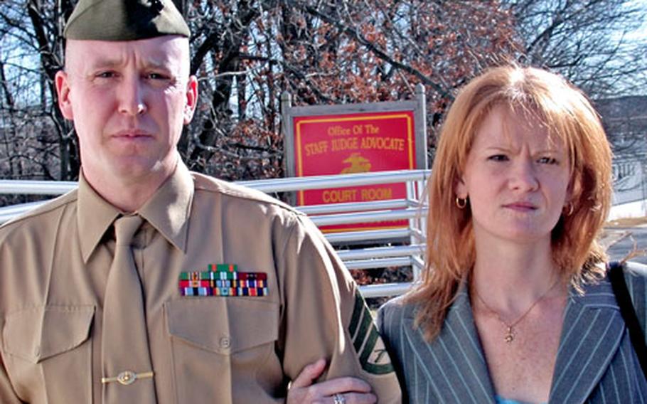 Marine Staff Sgt. Christopher VanGoethem leaves the courthouse at Marine Corps Base, Quantico, in Virginia with his wife, Kathy, during his trial last week.