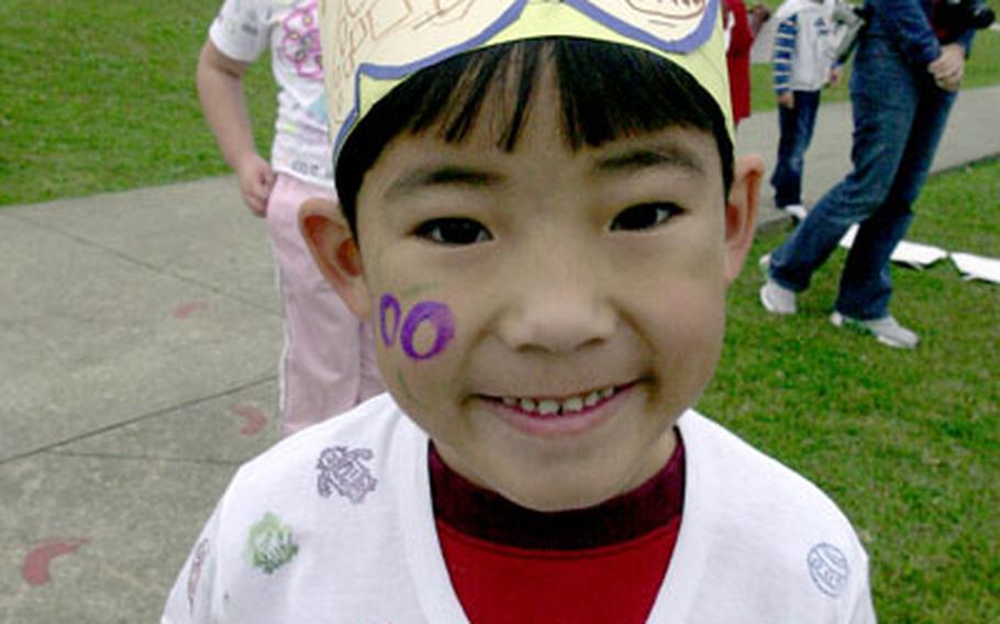 Bob Hope Primary School kindergarten student Riley Cullen shows off his 100th-day-of-school hat and shirt.