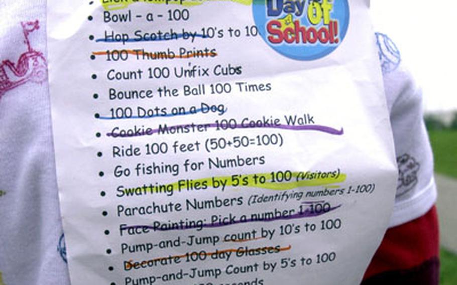 Students wore a list of 100-related activities that were individually crossed off as their class completed them.