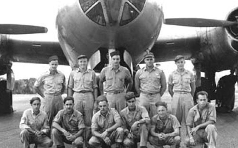 An undated photo of 11 U.S. aircrew members from a B-29 that crashed April 2, 1945, into a mountain at Yugimachi in Ome City, Japan, during World War II. Five American servicemembers were killed while six others parachuted to safety but were taken prisoner of war.