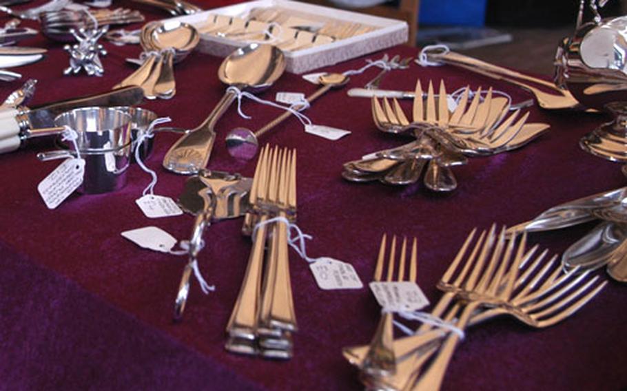 Early 20th Century silverware can be found at the antique fair.