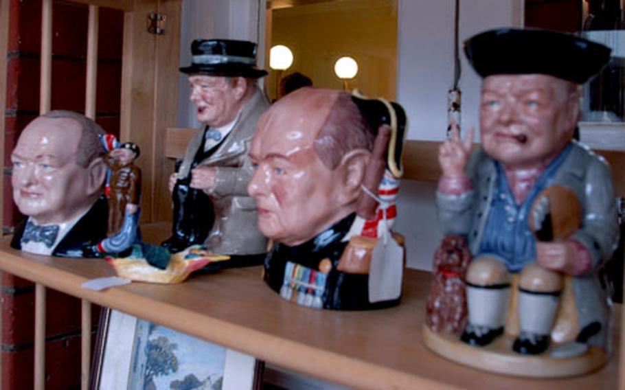 Winston Churchill figurines are among the many items for sale at the Newmarket Racecourse antique fair.