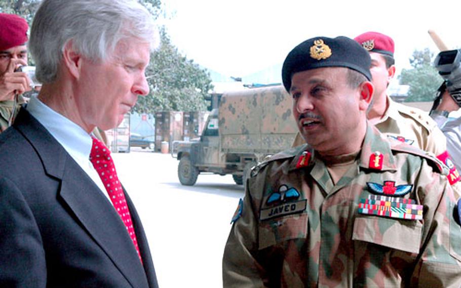 U.S. Ambassador to Pakistan Ryan Crocker with Maj. Gen. Javed Aslam Tahir, commander of Pakistani Army Aviation.