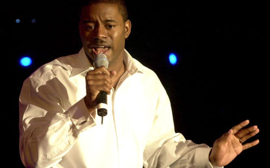 Air Force Senior Airman Tony Howard, a security forces journeyman stationed at Volkel Air Base, Netherlands, sings at the “USAFE Idol” competition on Saturday evening at Ramstein Air Base, Germany. Howard won the second annual singing contest singing Stevie Wonder’s “Superstition” and Ruben Studdard’s “Flying without Wings.”