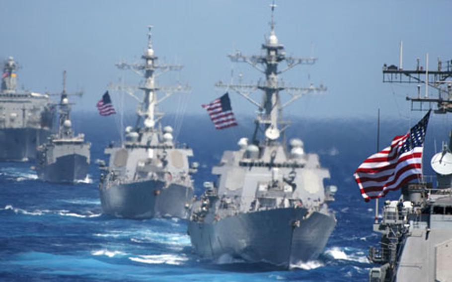 USS Cowpens is followed by USS Lassen