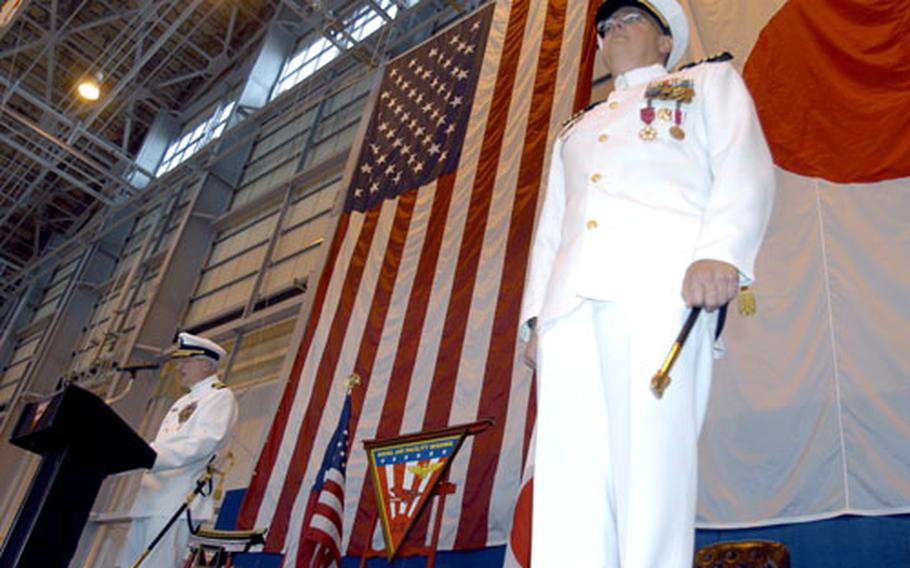 Capt. Peter B. Rush, left, took the reins of Naval Air Facility Misawa from Capt. R. Wayne Radloff at a change-of-command ceremony Wednesday.