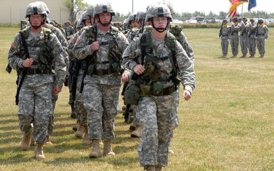 The 2nd Tactical Unmanned Aerial Vehicle Platoon marches off the parade field.