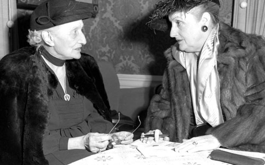 Baroness Kunigunde von Richthofen, left, mother of the Red Baron, talks with actress Fern Andra at the Wiesbaden American Civilian Club in November, 1954.