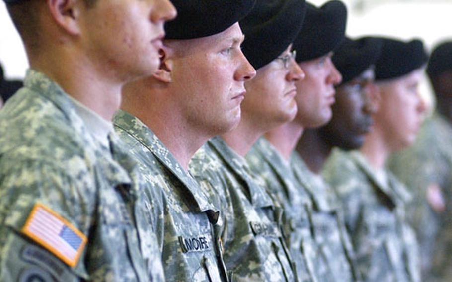 Soldiers of the 77th Maintenance Company listen to a speech at the official homecoming ceremony for the unit in Babenhausen, Germany on Thursday. They returned to Germany in April after being deployed to Operation Iraqi Freedom.