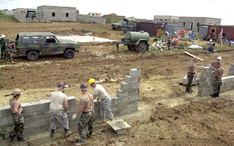 On Tuesday in Hohenfels, Germany, 83 soldiers from the North Dakota National Guard’s Company A, 142nd Engineer Combat Battalion (Heavy) were at the improvised explosive device lane laying a cinder block wall in an area that will look similar to the sort of compound troops might encounter in Iraq or Afghanistan.