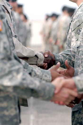 Leaders from U.S. Army Europe, the 3rd Corps Support Command and the 596th Maintenance Company shook hands with hundreds of 596th soldiers before a farewell ceremony Friday.