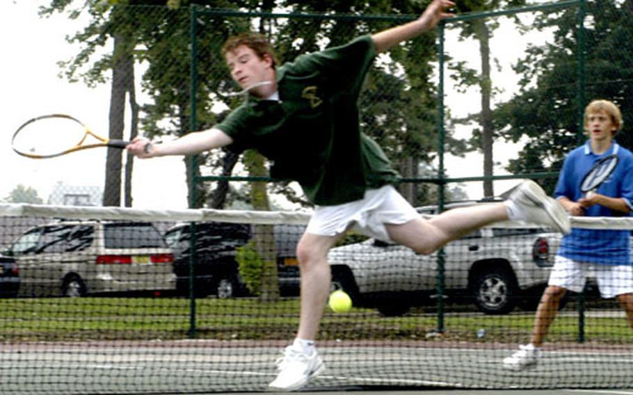 Alconbury tennis player Lyndon Bacon reaches out for a missed volley during the No. 1 doubles play between London Central High School and Alconbury High School.