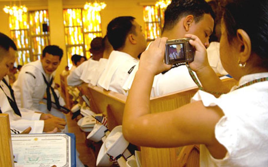 Friday&#39;s naturalization ceremony, worth recording for posterity, made American citizens of 94 sailors from 28 countries.