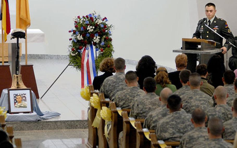 Pfc. Dannie Cooper, a comrade of Cpl. Luis Tejeda, recalls memories of the soldier during the memorial ceremony.