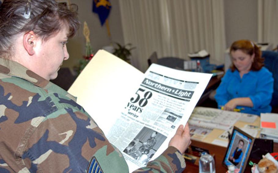 Staff Sgt. Angela Eggman, Northern Light editor, reads the last edition of the paper on Wednesday before it goes to print. The paper that comes out Friday will be Misawa’s last “newspaper” as the base makes the transition from hardcopy to an online format.