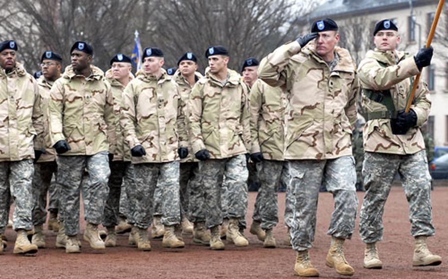 The V Corps Special Troops Battalion led by Lt. Col. Mark Gorton passes in review at the end of the assumption of command ceremony for incoming V Corps commander Lt. Gen. James Thurman.