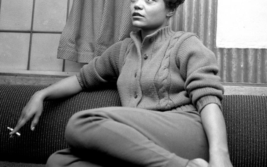 Eartha Kitt is interviewed in London in 1958.