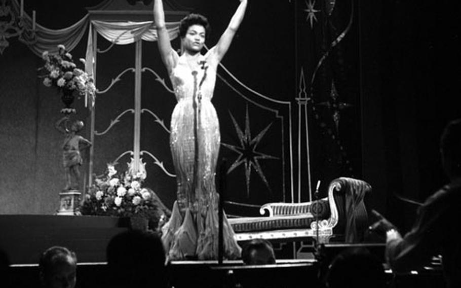 Eartha Kitt onstage in London in 1958.