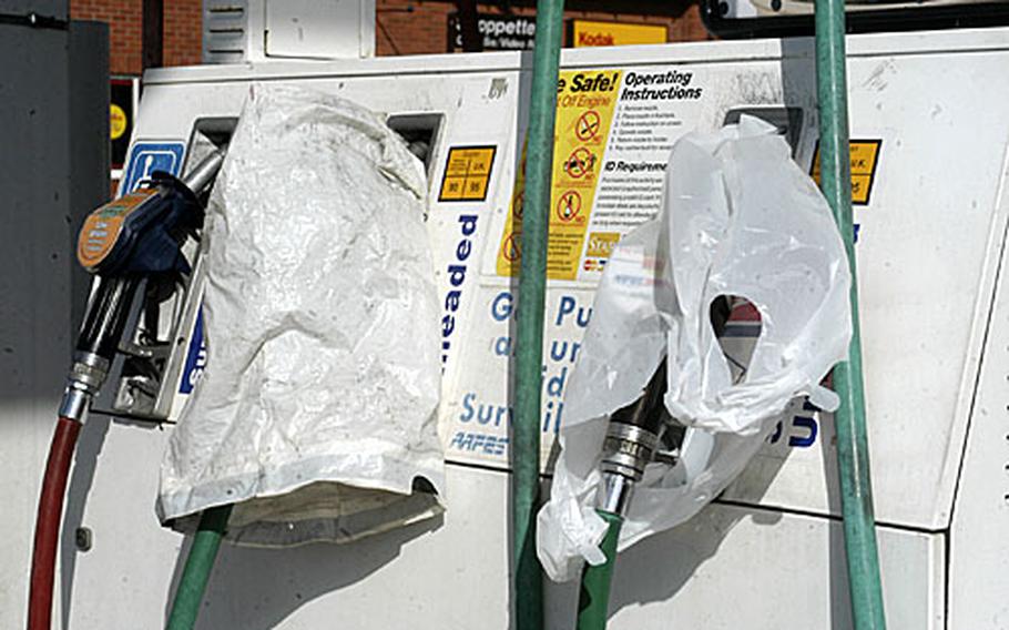 Plastic bags were put over the unleaded gas pumps at RAF Mildenhall&#39;s gas station last Thursday after tests showed that its gas was contaminated.
