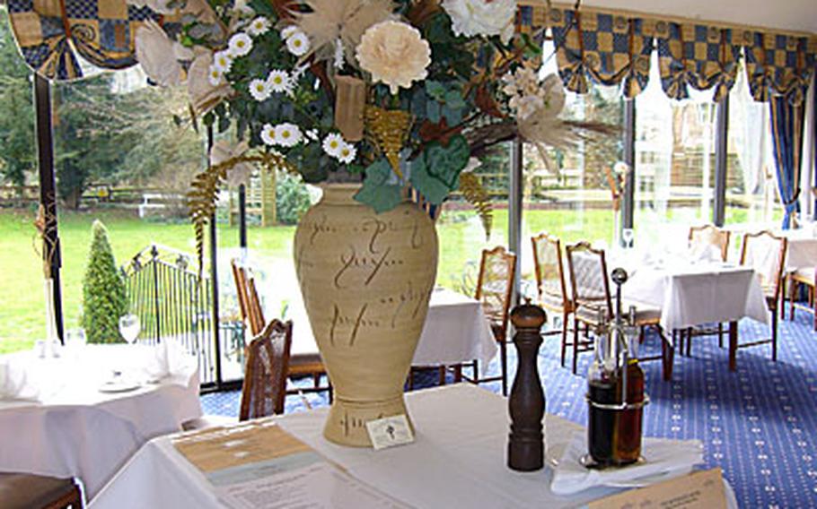 An elegant bouquet of flowers helps set the mood for diners at The Riverside Hotel in Mildenhall.