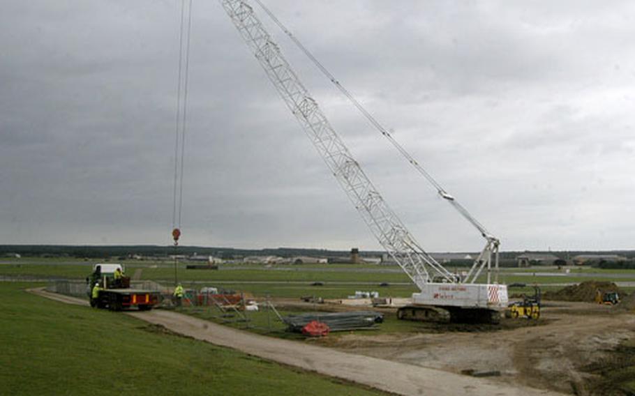 A crane lifts supplies into a construction area where a maintenance facility that will support RAF Lakenheath&#39;s small-diameter bomb mission is being built. Lakenheath has requested more than $17 million for various projects on the base.