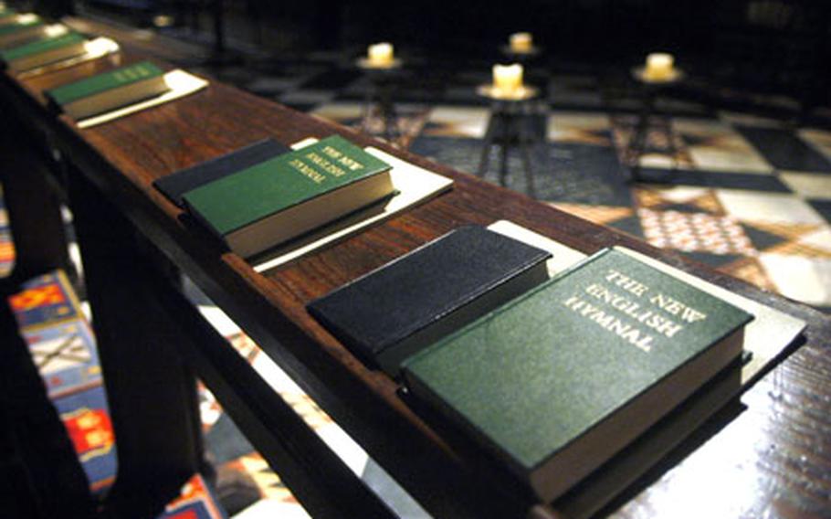 Hymn books sit at a pew inside the Ely Cathedral, a 12th- century Gothic architectural wonder that still holds daily services open to the public.