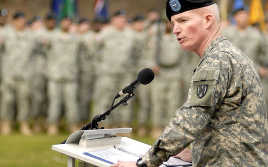 Brig. Gen. Scott West, the commander of the 21st Theater Support Command, addresses soldiers and visitors during a deactivation ceremony for the 1st Transportation Movement Control Agency, 37th Transportation Command and the 200th Theater Distribution Brigade Thursday at Panzer Kaserne.