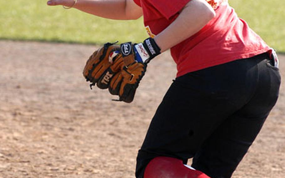 Lakenheath Lancers second baseman Maggie Pforts rushes to field a ground ball recently in practice before the team&#39;s first official game against Stuttgart, Germany.