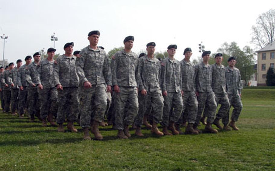 Soldiers of Troop A, 1st Squadron, 1st Cavalry Regiment, march in front of the reviewing stand during the squadron&#39;s inactivation ceremony Tuesday at Armstrong Barracks in Büdingen, Germany.