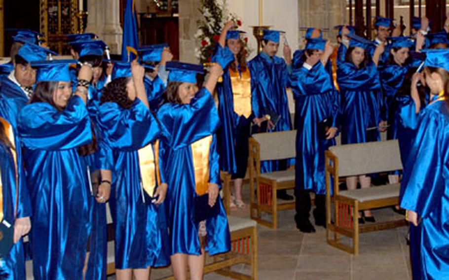 The members of the London Central High School class of 2007 turn their tassels at the end of the commencement ceremony held at All Saints Parish Church of High Wycombe.