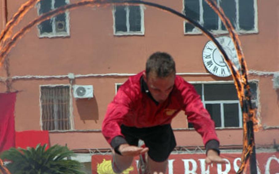 Strength, agility and acrobatic ability, including being able to jump through fiery hoops, are hallmarks of Italy’s Bersaglieri Brigade soldiers.