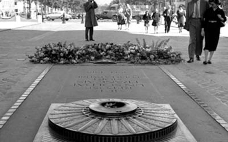 The Eternal Flame at the tomb of France's Unknown Soldier, at the base of the Arc de Triomphe.