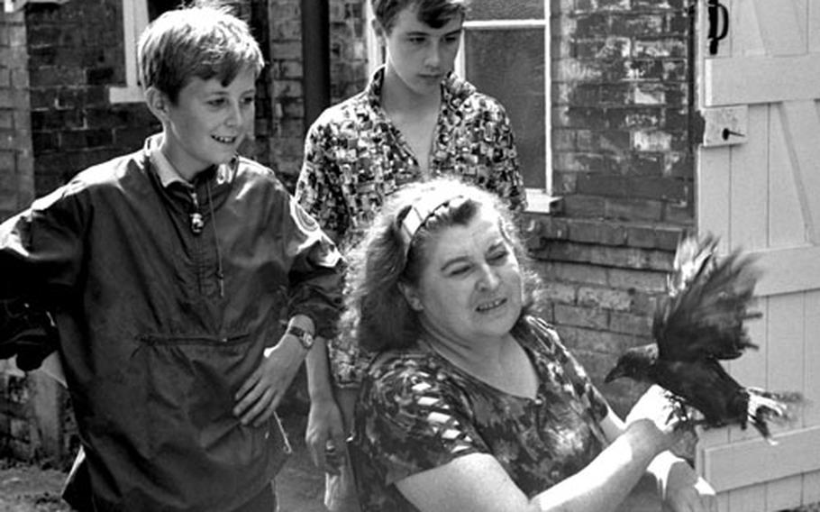 Sybil Leek with her sons Stephen and Julian and her walking jackdaw, Hotfoot Jackson.