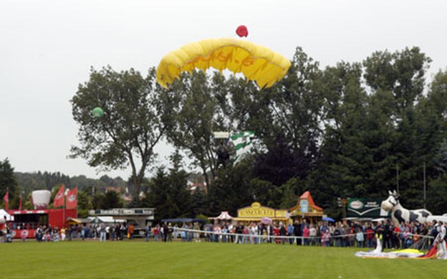 Rheinland-Pfalz Days - an annual three day festival - kicked off Friday with sky divers dropping down on Baumholder, which is the host city for this year&#39;s state fair.
