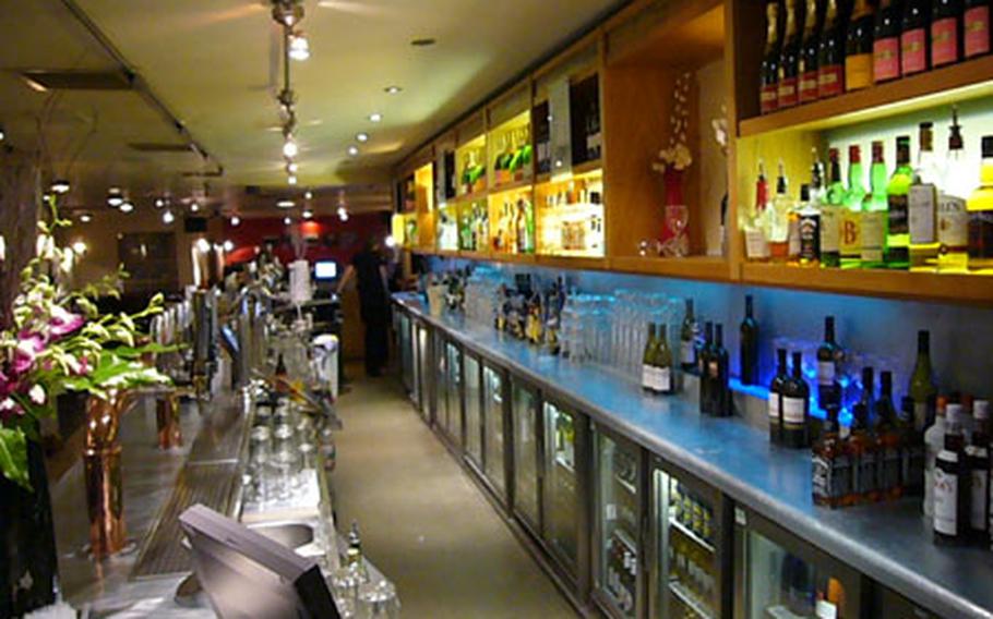 The Slug and Lettuce, in the middle of Cambridge, offers a wide variety of beer, food and specialty mixed drinks served out of its amply stocked and lengthy bar.