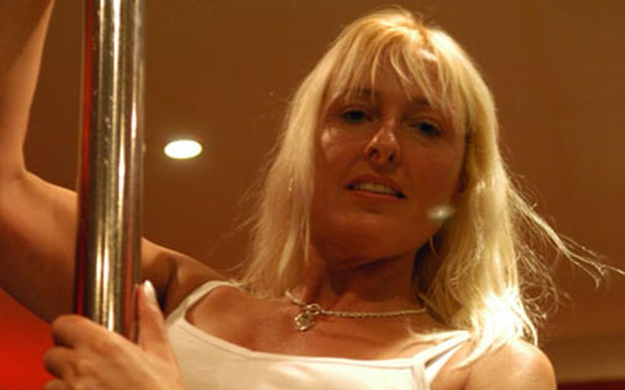 Pole dancing classes attract a diverse clientele, such as Marilyn Jones, 40, who attends classes with her daughter, Candice.