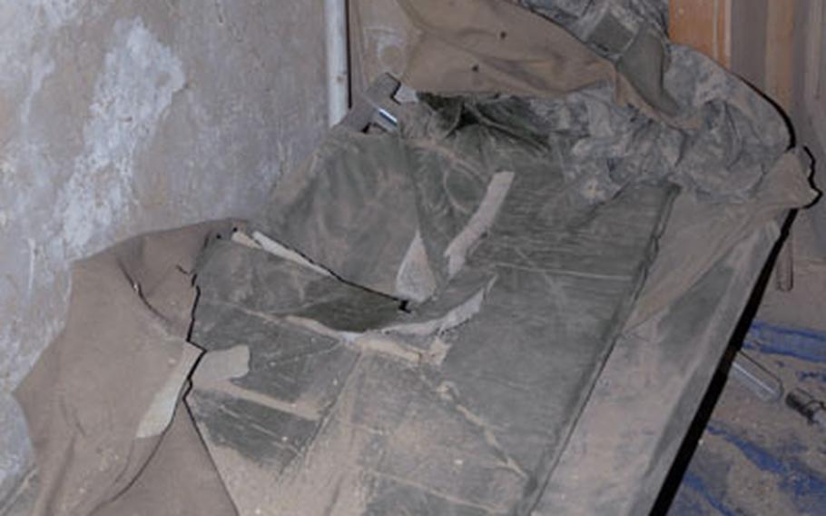 A cot was destroyed after recoilless rifle fire ripped through a nearby wall Monday at Fire Base Phoenix in Afghanistan. A recoilless rifle fires 80-90mm mortar rounds horizontally.