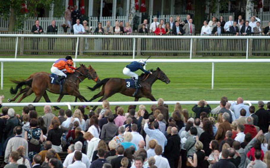 Gloved Hand (3) grabs the lead on her way to winning the fifth race, consisting of fillies and mares, on a recent Newmarket Nights event.
