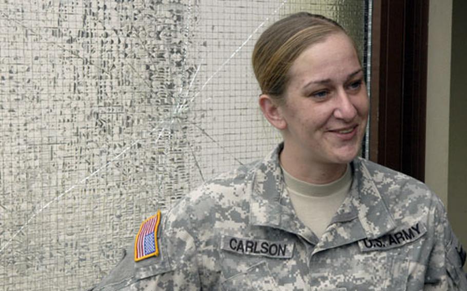 While the front door has been broken for about two years, Spc. Lisa Carlson said the door’s window has only been cracked for the past few months.