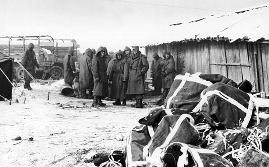 Members of the 1st Marine Division warm themselves at a fire at Advanced Airstrip Hagaruri near the Chosin Reservoir in December 1950 during the Korean War. Marine Pfc. Domenico “Nick” DiSalvo was last seen on Dec. 2, 1950, during a fierce battle at the Chosin Reservoir, as Chinese communists overran his unit from the front, back and middle. His remains recently were identified and he was to be buried with full military honors in Ohio on Thursday, on his 77th birthday.