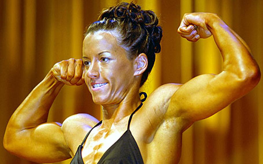 12th Far East Bodybuilding Competition women&#39;s heavyweight and overall champion Shannon Thomas of Kadena Air Base, Okinawa.