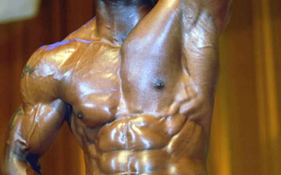 12th Far East Bodybuilding Competition men&#39;s light-heavyweight champion Kenny Walker of Camp Shields, Okinawa.