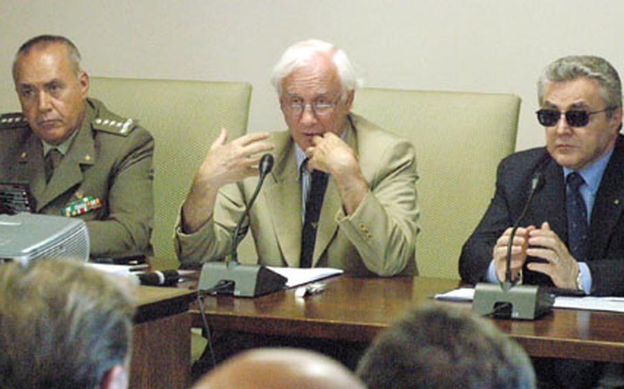 Paolo Costa, Italy’s point man on the Dal Molin airfield expansion project, talks to the media Wednesday during a press conference in Vicenza. Flanking him are Italy Army Gen. Ivan Resce, left, in charge of the country’s military construction projects, and Piero Mattei, prefect of the province of Vicenza.