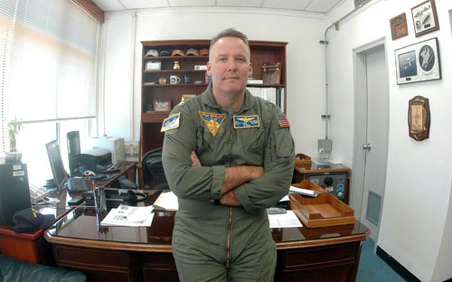Navy Capt. Thomas Quinn, 45, assumed command of Naval Air Station Sigonella, Sicily, on May 11.