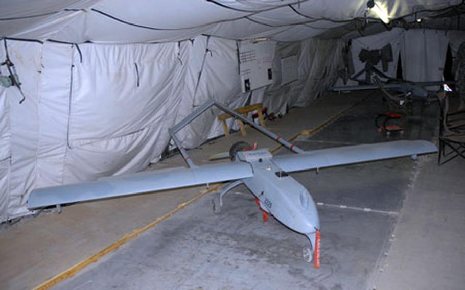 A Shadow unmanned aerial vehicle operated by the Tactical Unmanned Aerial Systems platoon from Company B, Special Troops Battalion, 173rd Airborne Brigade Combat Team sits in the platoon hangar Tuesday at Jalalabad Air Field, Afghanistan.