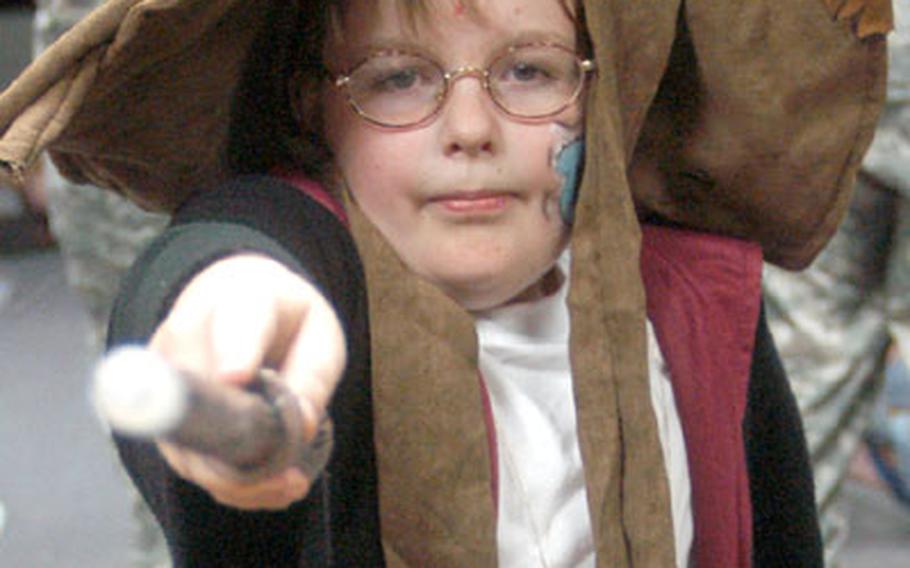 Collin West of Darmstadt, Germany, got into the spirit late Friday night while waiting for the release of the final book installment of Harry Potter. The 9-year-old won a replica of the magical Sorting Hat in a Harry Potter look-a-like contest at the Army and Air Force Exchange Service BookMark in Wiesbaden.