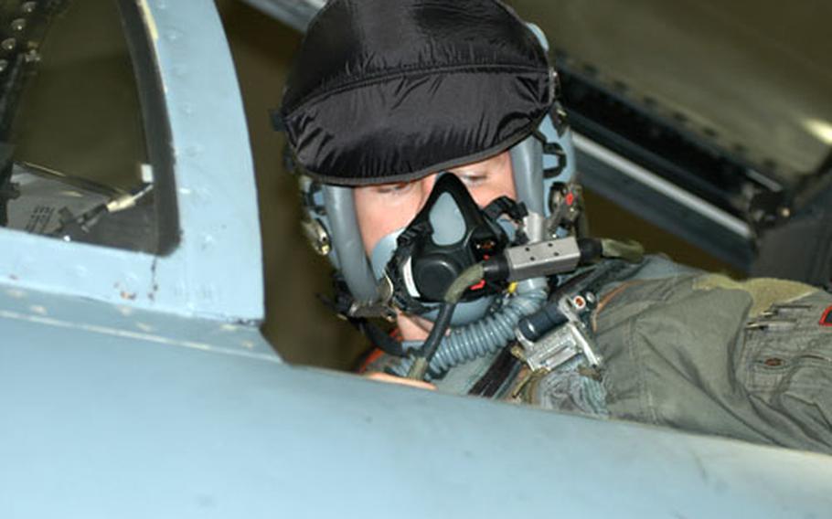 Capt. Jonathan Hough, an F-15C Eagle pilot from the 67th Fighter Squadron at Kadena Air Base, Okinawa, prepares to head out on a training sortie.