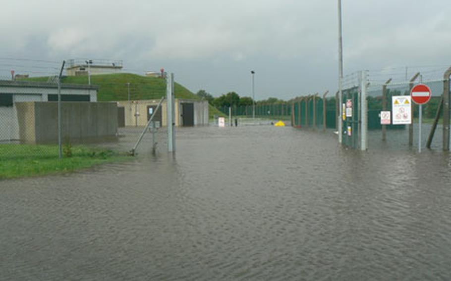 One of RAF Fairford&#39;s fuel operations compounds submerged by rainwater on Saturday.