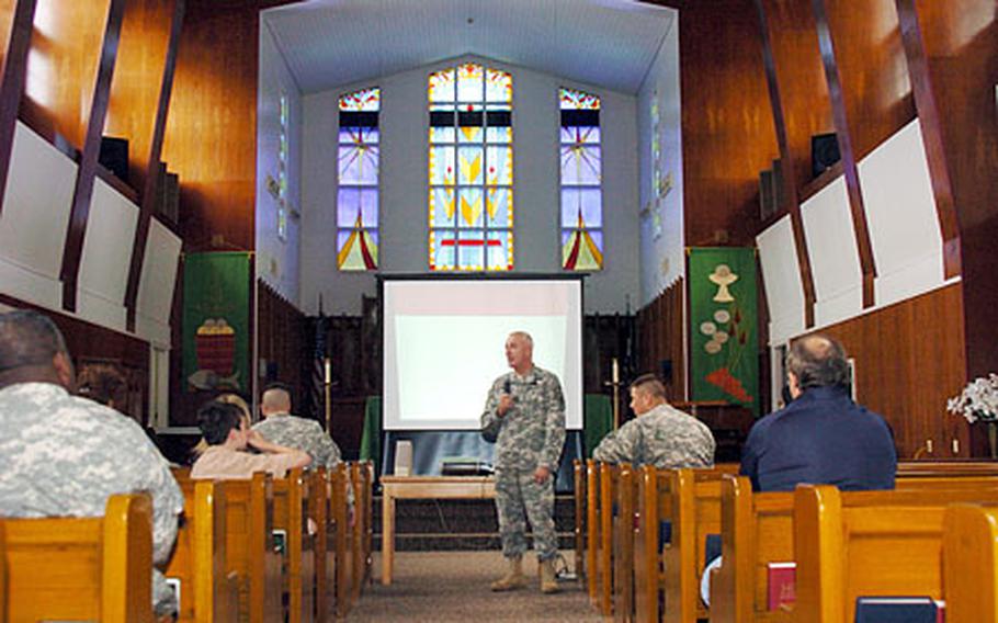 Col. Allen Blake Boatright, command chaplain for U.S. Army Japan, speaks to the congregation.